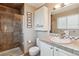 Well-maintained bathroom featuring a glass shower and a functional vanity at 7521 S Race St, Centennial, CO 80122