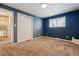 Simple bedroom with a closet and a window at 7521 S Race St, Centennial, CO 80122