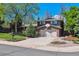 Charming two-story home with a brick facade, attached garage, well-manicured lawn, and inviting curb appeal at 7521 S Race St, Centennial, CO 80122