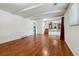 Spacious living room boasts hard wood floors, bright light, and access to upstairs at 7521 S Race St, Centennial, CO 80122