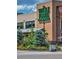 Exterior of Whole Foods Market with lush landscaping in front, promoting healthy living and convenience at 7521 S Race St, Centennial, CO 80122
