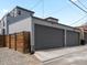 Spacious two-car garage with modern doors, offering ample parking and storage solutions at 1568 Wolff St, Denver, CO 80204