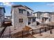 Beautiful two-story home featuring stone accents, a covered porch, and landscaped front yard at 3324 N Haleyville Ct, Aurora, CO 80019