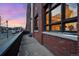 Exterior view of building with brick facade and large windows, offering ample natural light and architectural interest at 2500 Walnut St # 106, Denver, CO 80205