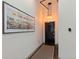 Hallway features unique artwork, a patterned runner and modern lighting at 2500 Walnut St # 106, Denver, CO 80205
