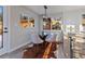 Cozy breakfast nook with round table and bright windows at 11725 Tomahawk Trl, Conifer, CO 80433
