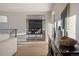Open-concept layout showcasing living and dining areas with natural lighting at 11725 Tomahawk Trl, Conifer, CO 80433