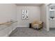 A cozy sitting room with a view and modern decor at 11725 Tomahawk Trl, Conifer, CO 80433