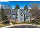 Aerial shot of condo complex showcasing well-maintained landscaping and ample parking at 4086 S Carson St # F, Aurora, CO 80014