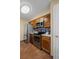 Modern kitchen featuring stainless steel appliances and dark wood cabinetry at 4086 S Carson St # F, Aurora, CO 80014