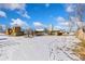 Farmland with hay bales, barn, and silo under a bright sky at 8003 N 95Th St, Longmont, CO 80504