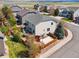 Aerial view featuring the home's backyard with a patio, deck, and landscaping, and outdoor basketball court at 7869 Solstice Way, Castle Rock, CO 80108