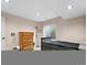 Bedroom featuring a dark-colored bed and light-colored walls at 7869 Solstice Way, Castle Rock, CO 80108