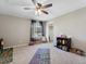 Bright bedroom with carpet, ceiling fan and ample space for play at 7869 Solstice Way, Castle Rock, CO 80108