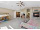 Spacious bedroom featuring a fireplace and access to the en-suite bathroom at 7869 Solstice Way, Castle Rock, CO 80108