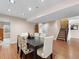 Dining room boasting hardwood floors, table with seating, and easy access to other rooms at 7869 Solstice Way, Castle Rock, CO 80108