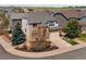 Charming exterior of a well-maintained home with a neatly landscaped yard and attached garage at 7869 Solstice Way, Castle Rock, CO 80108