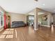 Spacious living room with hardwood floors, neutral walls, and abundant natural light at 7869 Solstice Way, Castle Rock, CO 80108