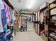 Large walk-in closet featuring custom shelves and storage at 7869 Solstice Way, Castle Rock, CO 80108