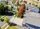 An aerial view of homes with autumn trees accenting the well manicured lawns in this neighborhood at 23029 Cleveland Dr, Parker, CO 80138