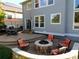 Cozy backyard featuring a stone fire pit surrounded by comfortable seating at 23029 Cleveland Dr, Parker, CO 80138