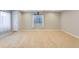 Finished basement featuring neutral carpet, a window, and ample space for recreation at 23029 Cleveland Dr, Parker, CO 80138