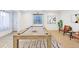 Finished basement with a billiards table, a light neutral color and a walkout door at 23029 Cleveland Dr, Parker, CO 80138