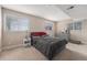 Comfortable bedroom with plush carpeting, natural light, and a soothing color palette at 7522 S Mount Zirkel, Littleton, CO 80127