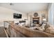 Inviting living room with fireplace, built-in shelving, and comfortable seating for relaxation at 7522 S Mount Zirkel, Littleton, CO 80127