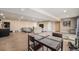 Large living area featuring wood floors, neutral paint, and plenty of space for entertaining at 7522 S Mount Zirkel, Littleton, CO 80127