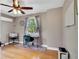 Bright bedroom features a desk, hardwood floors, and bright natural light at 2236 Forest St, Denver, CO 80207