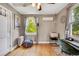Bright bedroom features a desk, hardwood floors, and window at 2236 Forest St, Denver, CO 80207