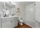 Bright bathroom featuring a tub-shower combination and a modern vanity at 12924 Ironstone Way # 103, Parker, CO 80134