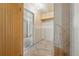 Walk-in closet with shelving and open doorway at 12924 Ironstone Way # 103, Parker, CO 80134