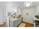 Modern kitchen with sleek countertops, gray cabinetry, and a functional design at 12924 Ironstone Way # 103, Parker, CO 80134