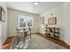 Bright office space featuring wood floors, modern furnishings, and ample natural light for work at 12924 Ironstone Way # 103, Parker, CO 80134