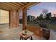 A peaceful outdoor patio with brick accents provides a relaxing space and views of the neighborhood at 12924 Ironstone Way # 103, Parker, CO 80134