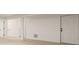 Unfinished basement with neutral carpeting and multiple doors at 3012 S Jericho Way, Aurora, CO 80013