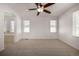 Spacious bedroom with ceiling fan and neutral decor at 3012 S Jericho Way, Aurora, CO 80013