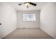 Well-lit bedroom featuring a ceiling fan and window blinds at 3012 S Jericho Way, Aurora, CO 80013
