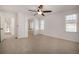 Bright bedroom with ceiling fan and access to en-suite bathroom at 3012 S Jericho Way, Aurora, CO 80013