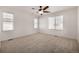 Spacious bedroom with neutral carpeting and ceiling fan at 3012 S Jericho Way, Aurora, CO 80013