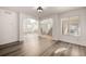 Open dining area with hardwood floors and access to kitchen at 3012 S Jericho Way, Aurora, CO 80013