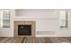 Gas fireplace with built-in shelving at 3012 S Jericho Way, Aurora, CO 80013