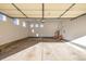 Attached garage with ample space and access door at 3012 S Jericho Way, Aurora, CO 80013