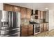 Well-equipped kitchen with stainless steel appliances and granite countertops at 3012 S Jericho Way, Aurora, CO 80013