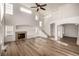 Spacious living room, high ceilings, hardwood floors, and fireplace at 3012 S Jericho Way, Aurora, CO 80013