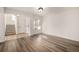 Spacious living room with hardwood floors and large windows at 3012 S Jericho Way, Aurora, CO 80013