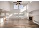 Spacious living room with hardwood floors and a fireplace at 3012 S Jericho Way, Aurora, CO 80013