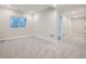Finished basement with neutral carpet, a window, and plenty of space at 6906 Kendrick Ln, Arvada, CO 80007